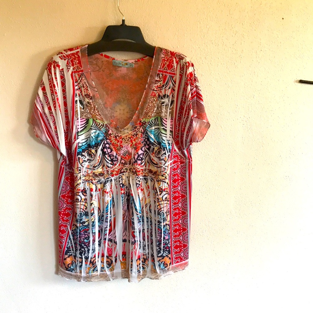 55) NWOT Blouse/tunic. Pretty multicolored print!